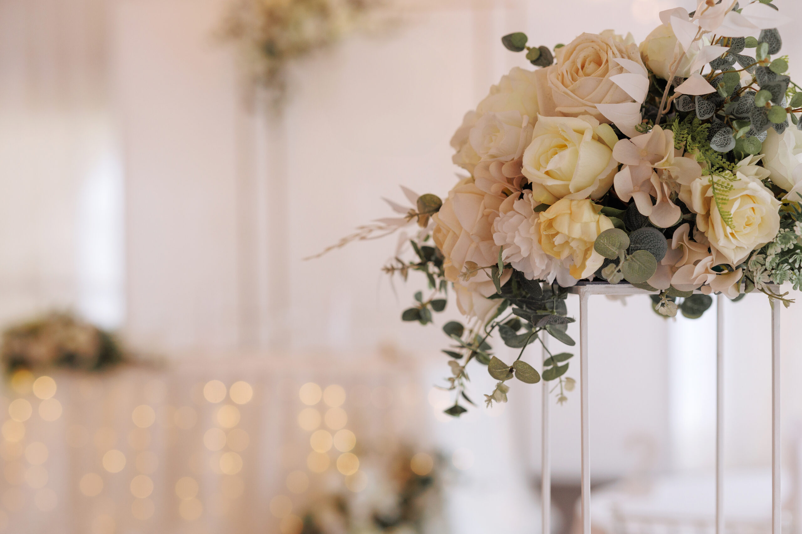 Elegant roses and greenery wedding reception decor at VWVenues